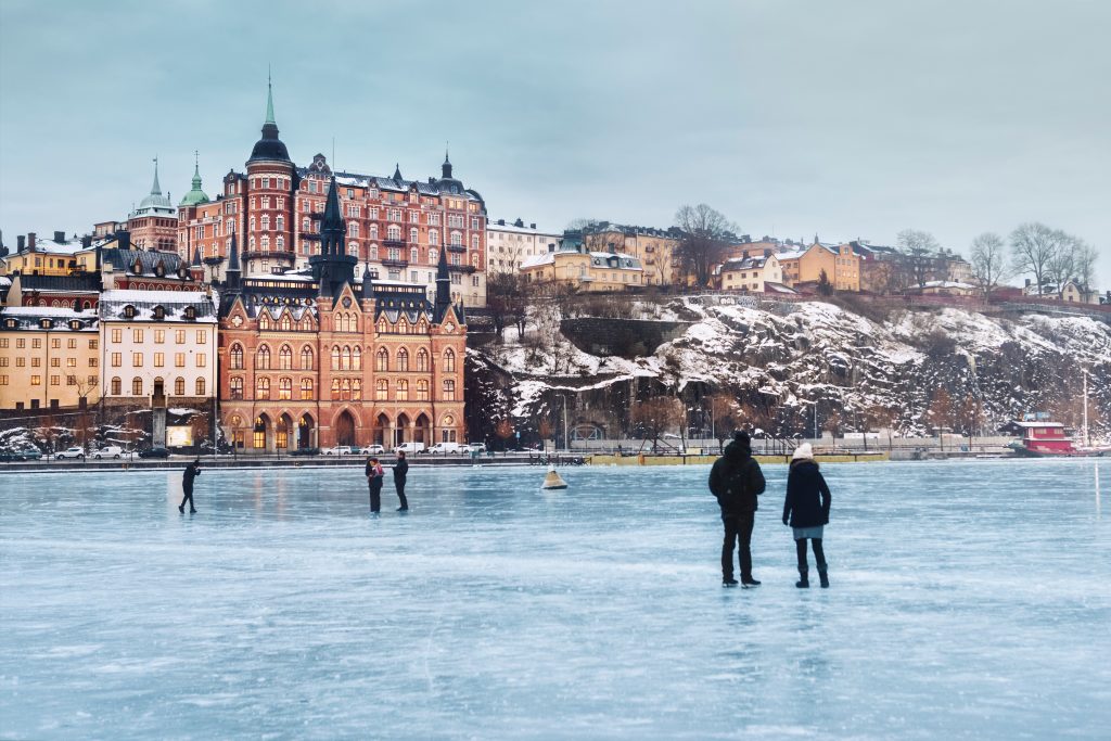 People walking on an icy lake in Stockholm