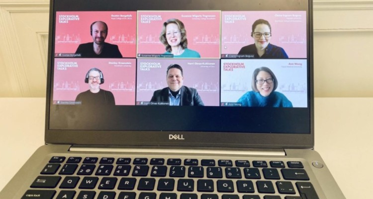 Computer screen showing video conferencing people in a row